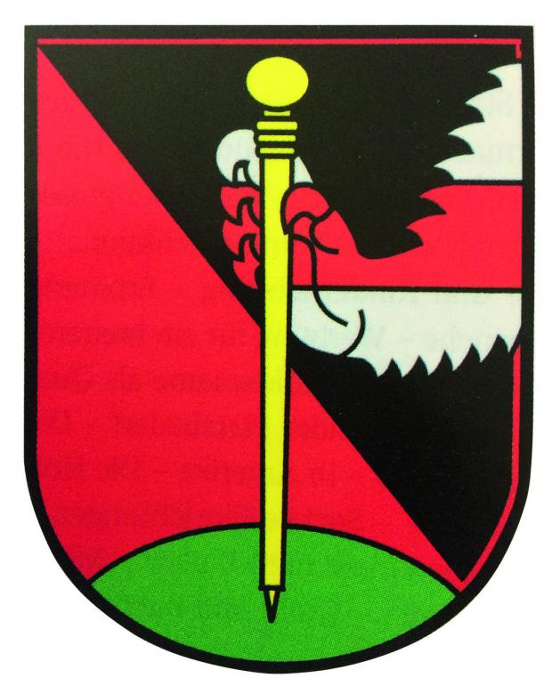 Wander's coat of arms. As a new member of the Bernese Burgergemeinde, Wander had a family coat of arms designed: the Bernese colours, a staff and a lion's paw, which features in the coat of arms of Hesse, in reference to Wander's German origins. © Burgergemeinde Bern