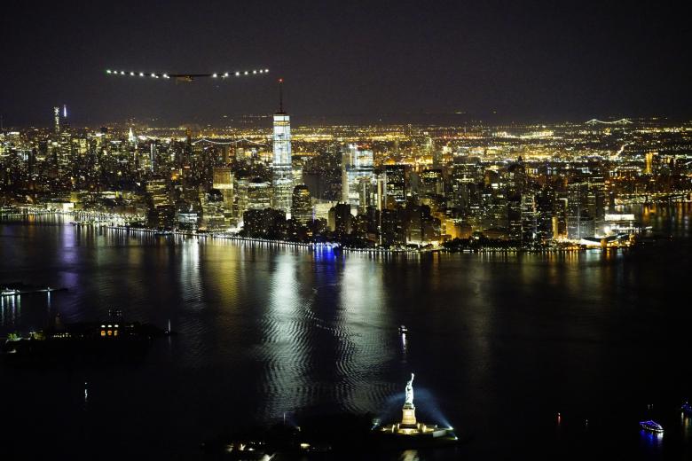 Solar Impulse 2 overflying the Statue of liberty by night