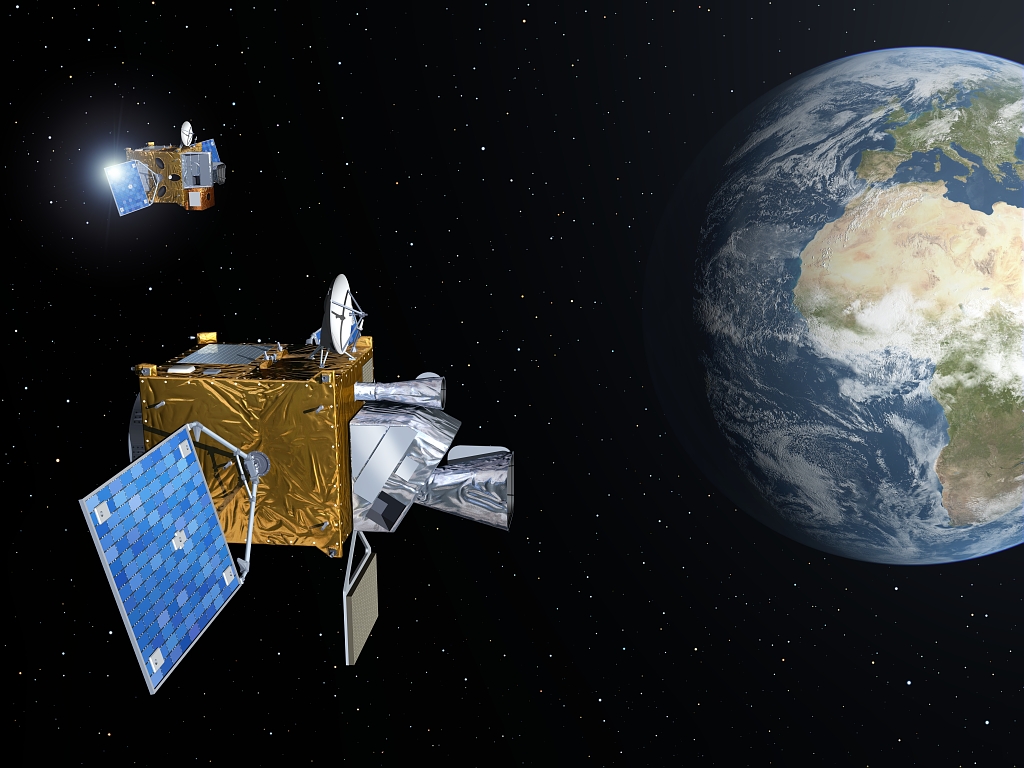 Deux satellites MTG en orbite autour de la Terre (illustration). © ESA