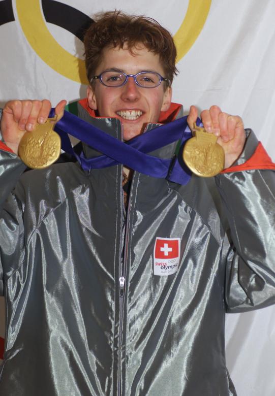 Winter 2002 Salt Lake City Olympic Games, Ski Jumping - Medal ceremony. Simon AMMANN (SUI) 1st, with his two gold medals. © 2002 / Comité International Olympique (CIO)