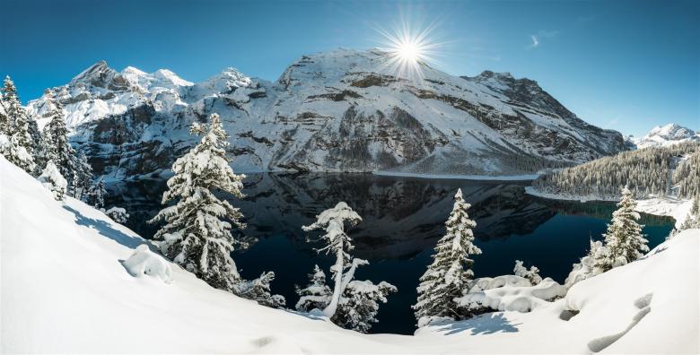 Jour d'hiver a Oeschinensee au-dessus de Kandersteg. © Switzerland Tourism/Martin Maegli