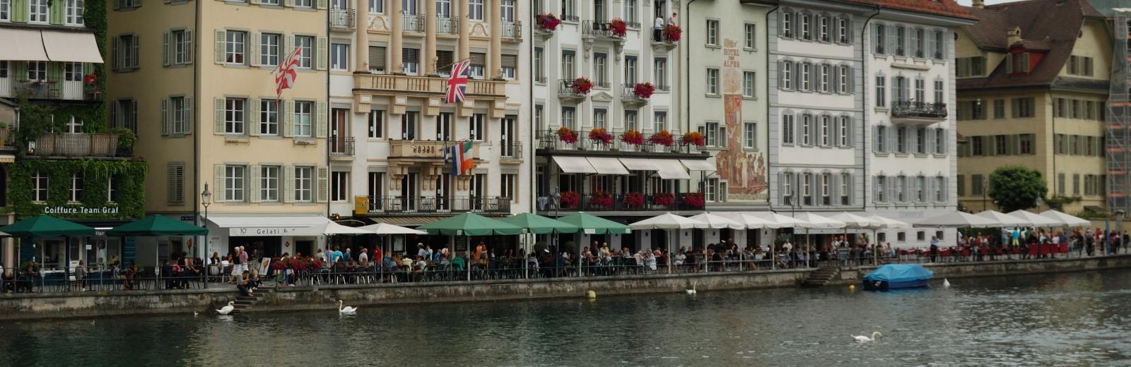 Riverside bar scene, Lucerne (hi-res). Credit: © Simon Conway