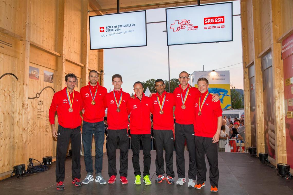 The Swiss medallists strike a pose at the House of Switzerland