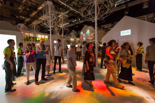 Visitors explore the interactive Swiss Pavilion at Expo 2017 in Astana.