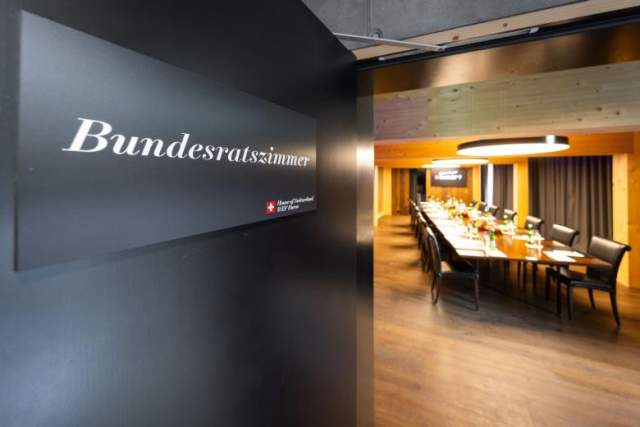 Image of a table with a sign Bundesratszimmer at the WEF Davos
