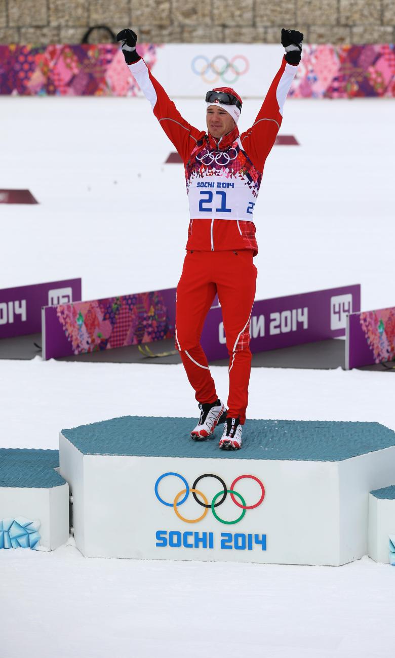 Winter Olympics Sochi 2014, Cross-country skiing, 30km skiathlon Men - Bouquets ceremony. Dario COLOGNA (SUI) 1st. © 2014 / Comité International Olympique (CIO) / GRAYTHEN, Chris