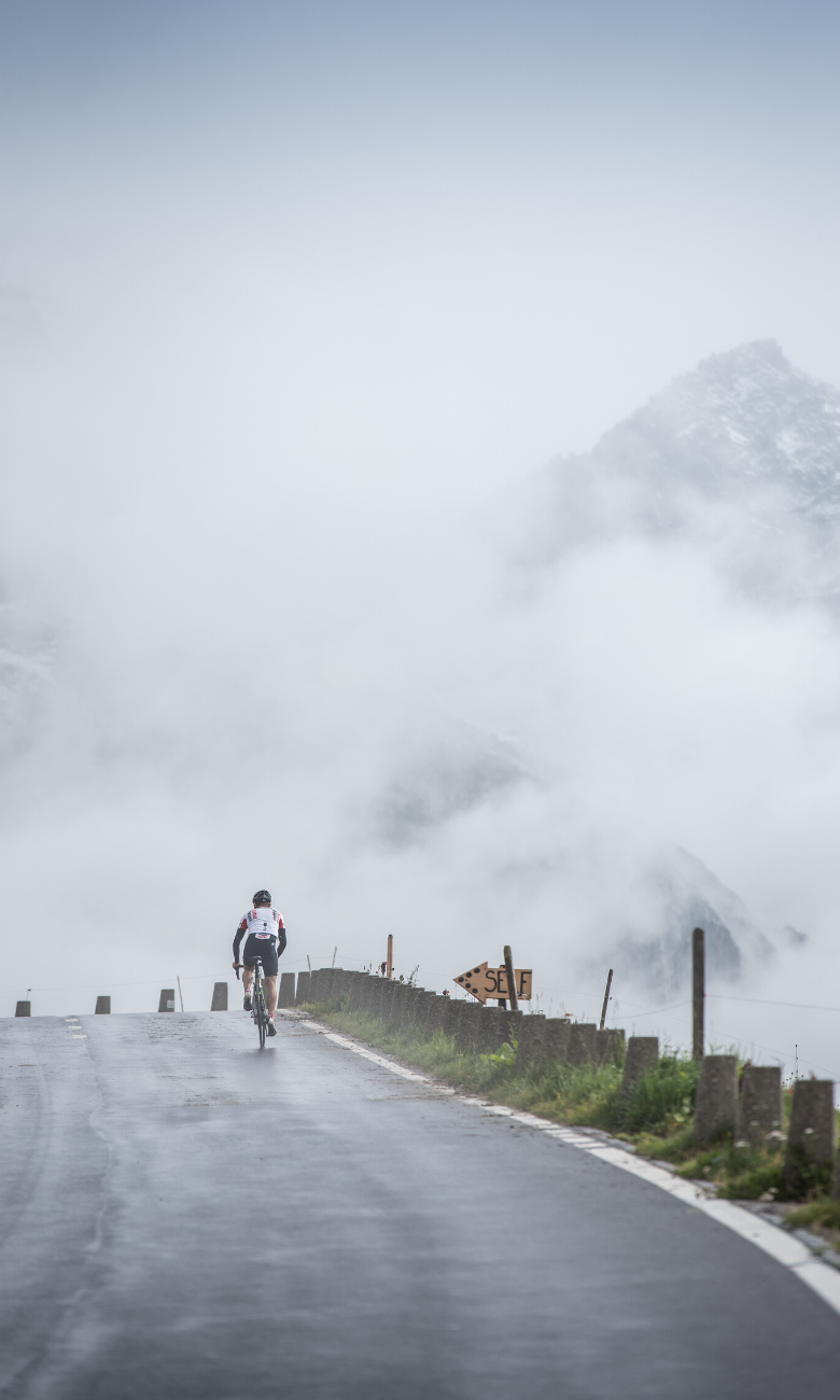 Cyclist on the Urnerseite of the Furkapasses.