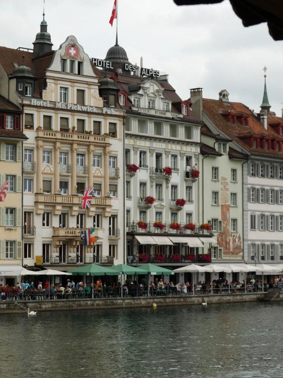 Riverside bar scene, Lucerne (hi-res). Credit: © Simon Conway